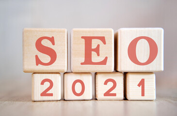 Seo 2021 concept. Wooden cubes on a black keyboard