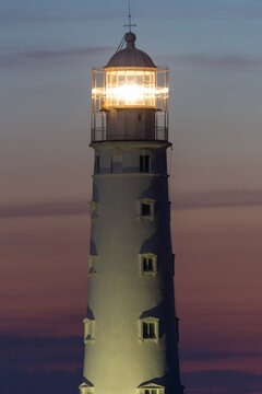 lighthouse against the sky at sunset, use as background