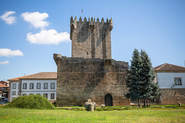 Fototapeta na wymiar View at the exterior facade tower at Castle of Chaves, an iconic monument building at the Chaves city, portuguese patrimony