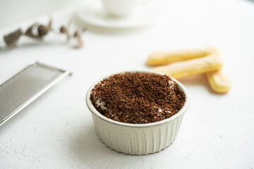 Tiramisu. Traditional italian dessert on white plate.