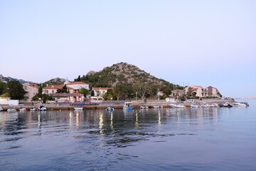 Obraz premium Beautiful view of Sveti Juraj, Croatia. A small quiet port village on the Adriatic with crystal clear water.
