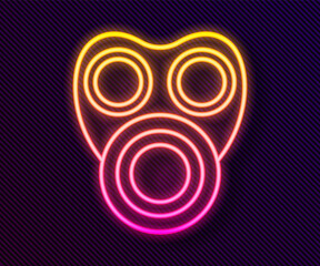 Glowing neon line Gas mask icon isolated on black background. Respirator sign. Vector.