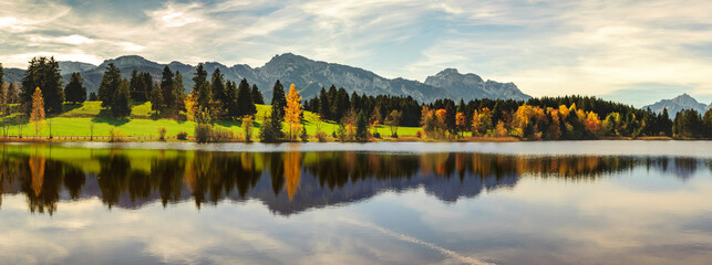 Fototapeta premium panoramic view to beautiful lake with reflection in Bavaria, Germany