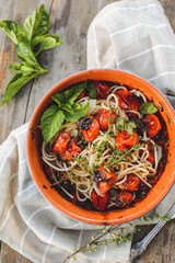 Spaghetti with minced meat and vegetables. top view, rustic style