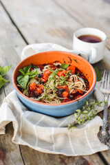 Spaghetti with minced meat and vegetables. top view, rustic style
