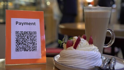 QR code payment is a contactless payment method where a payment is performed by scanning a QR code from a mobile app