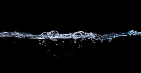 Water drinking, Water wave splash isolated black background.
