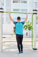 Young boy training in a park