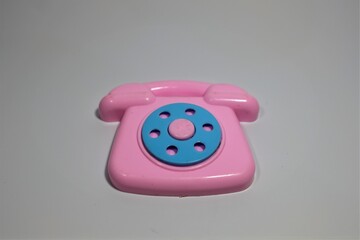 Old model phone photo in toy shape