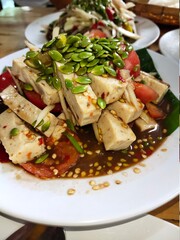 Som Tum with Moo Yor Thai-Isan food.