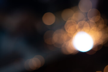 Gold abstract bokeh background, Festive xmas abstract background with bokeh defocused lights and stars  © Konkhay