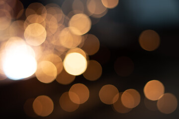 Gold abstract bokeh background, Festive xmas abstract background with bokeh defocused lights and stars
