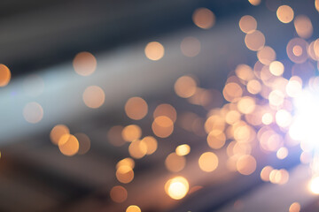 Gold abstract bokeh background, Festive xmas abstract background with bokeh defocused lights and stars
