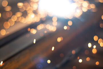 Gold abstract bokeh background, Festive xmas abstract background with bokeh defocused lights and stars
