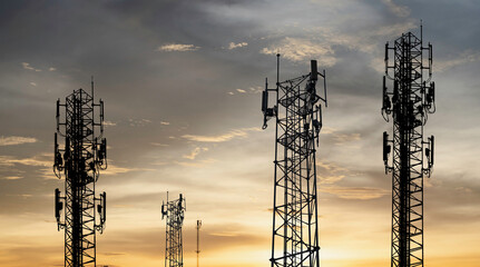 Signal tower on the evening sunset background.
