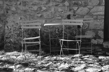 Table in front of an old house (black & white)