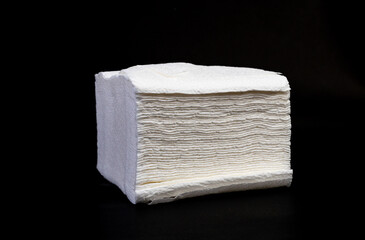 Crumpled tissue paper isolated on black background texture