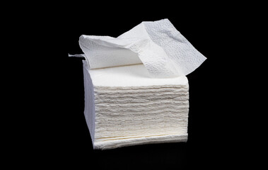 Crumpled tissue paper isolated on black background texture