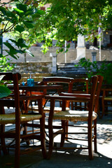 Fototapeta na wymiar table and chairs in a cafe (in the central square of a village)