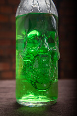 green bottle on a dark background