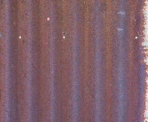 Naklejka premium Old rust texture on brown background.