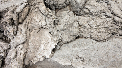 Fototapeta premium Concrete, weathered, worn with cracks and scratches. Landscape style. Rough Concrete Surface. Great background or texture. Monochrome old concrete wall background