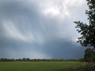 Obraz na płótnie Canvas Rain clouds. Threatning Thunderclouds. Havelte Drenthe Netherlands. Holtingerveld.