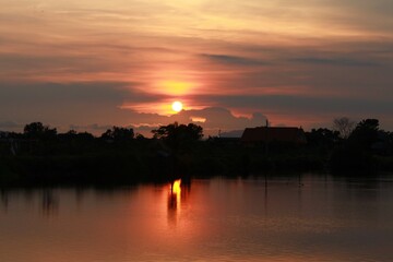 Fototapeta premium sunset over the river