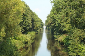 Fototapeta na wymiar View over the Ems-Jade Canal in Aurich-Wiesens, Germany