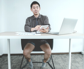 Entrepreneur business people office workers work from home Dress only half up for remote conference meetings with laptop