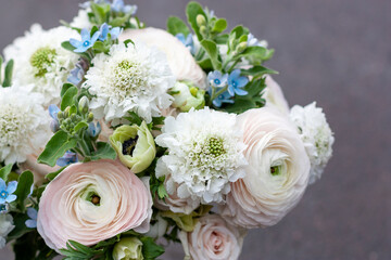 Bouquet of flowers with Ranunculus, anemones close-up