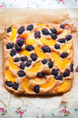 Cake with blackberries and peaches 
