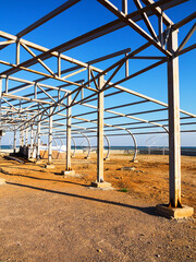 Steel structures on waterfront. Construction of summer cafe on black sea coast in Odessa.