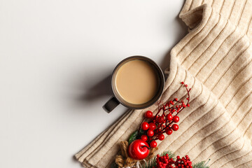 Abstract autumn composition. Colorful background image. Autumn, winter concept. Top view. Flat lay. Copy space. Plaid, dried leaves, cup of coffee on white background. Thanksgiving day concept
