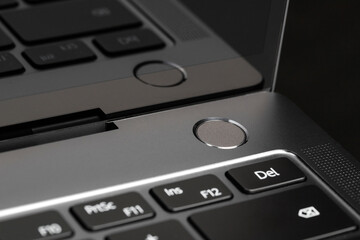 Obraz premium keyboard buttons and laptop fragments in black and silver, background