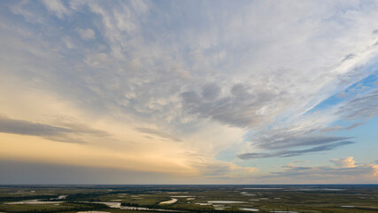Obraz premium Landscape of the forest-tundra and the sandy river bank, bird's eye view.Arctic Circle, tunda. Beautiful landscape of tundra from a helicopter.