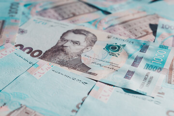 Ukrainian hryvnia in the face value of one thousand hryvnias, texture of one thousand hryvnia banknotes close-up.
