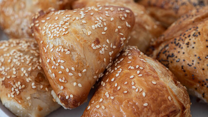 Assortment of burekas with cheese and mushrooms