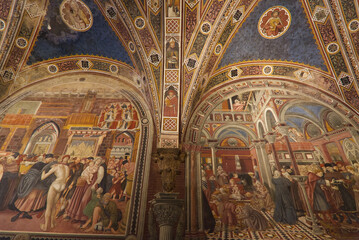 Fototapeta na wymiar Decorated ceiling of Santa Maria della Scala's Pilgrims Hall in Siena
