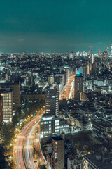 Night view of Tokyo City, traffics and buildings.