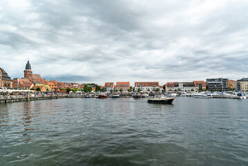 Fototapeta na wymiar the harbor and old town of Waren on Lake Mueritz in Germany