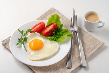 Food poster - Healthy and hearty breakfast. Close-up of a fried eggs, tomato, herbs and espresso coffee. Served on a white table with a linen napkin and cutlery.