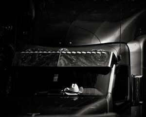 Black and white truck cab with cowboy hat