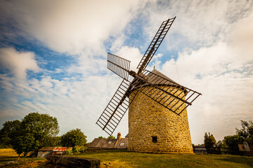 Fototapeta na wymiar Windmill near Dol-de-Bretagne in Brittany, France