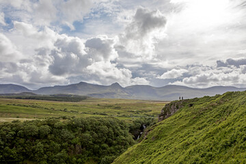 Clouds giving the impression of dancing above cliffs and mountains in isle of Skye.