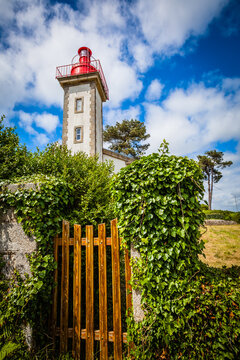 Historic lighthouse at the harbour of Benodet in Brittany, France