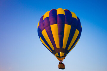 Fototapeta premium Big balloon flies against the sky