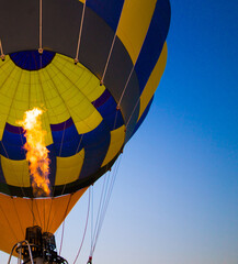 Big balloon flies against the sky