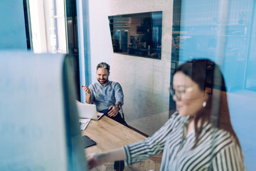 Businessman having meeting in workplace © BullRun