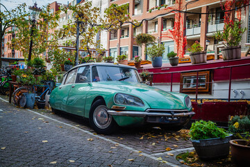 Old car and boat in Amsterdam, Netherland